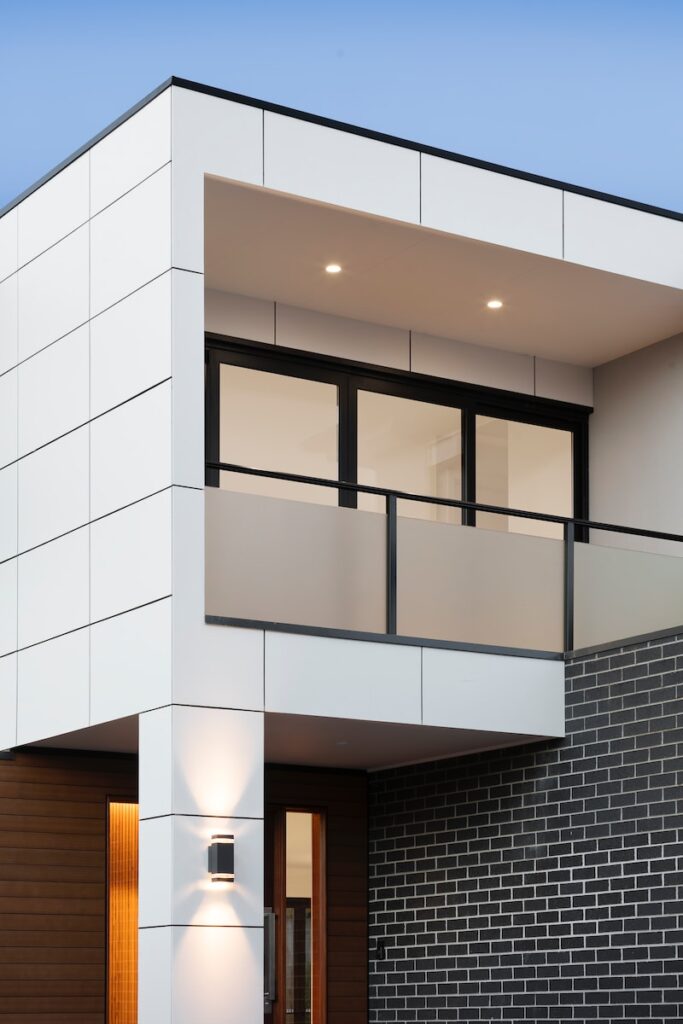 Photo by R ARCHITECTURE white and brown concrete building