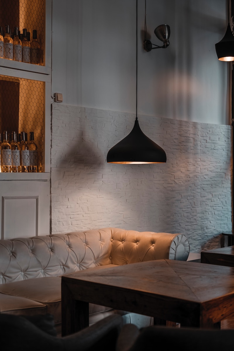 Photo by Connor Wang tufted sofa near coffee table